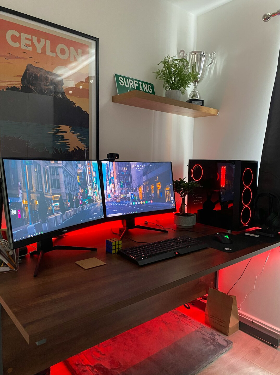 Video editing workstation with multiple monitors showing a timeline