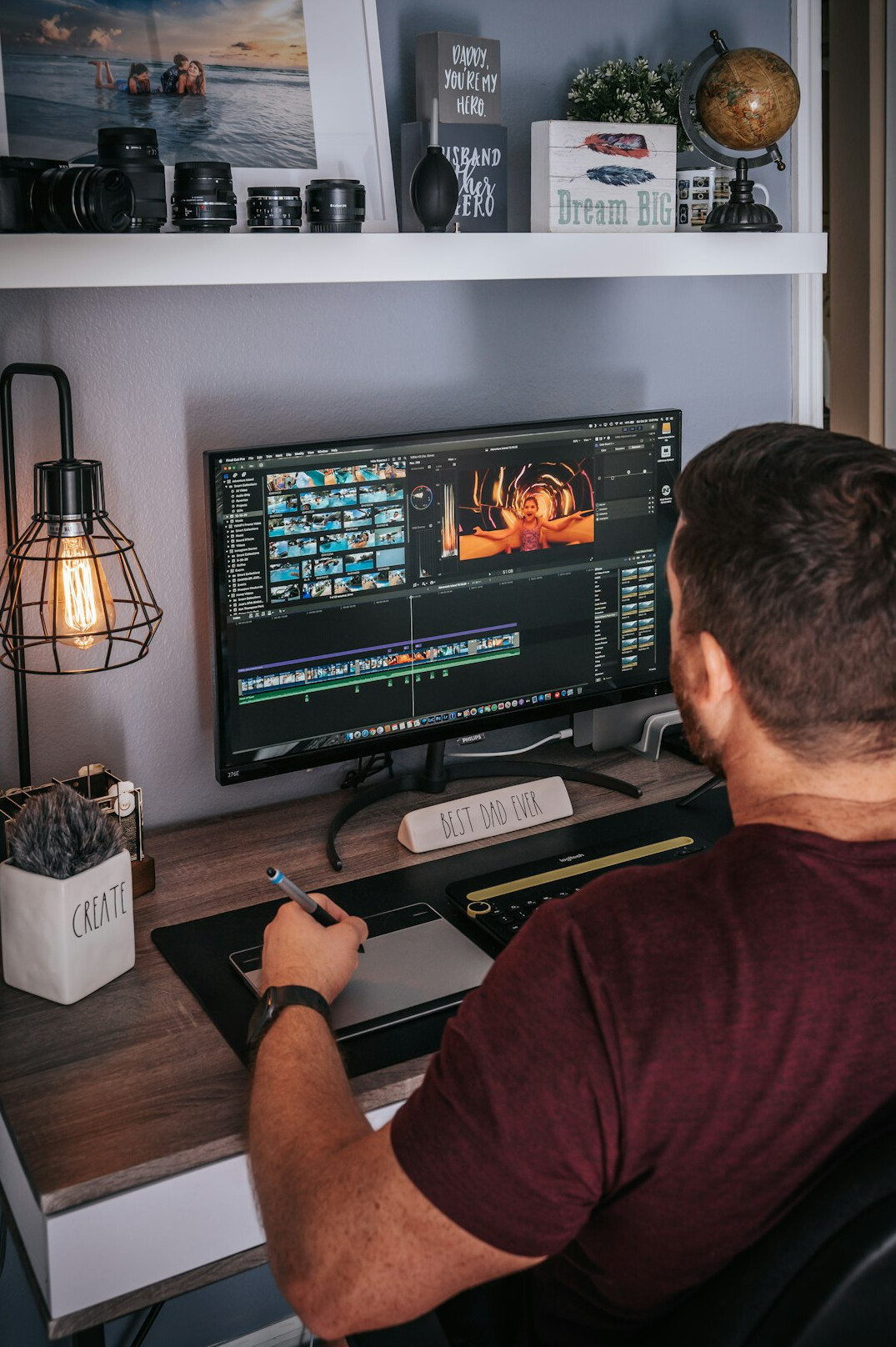 video editor working on computer