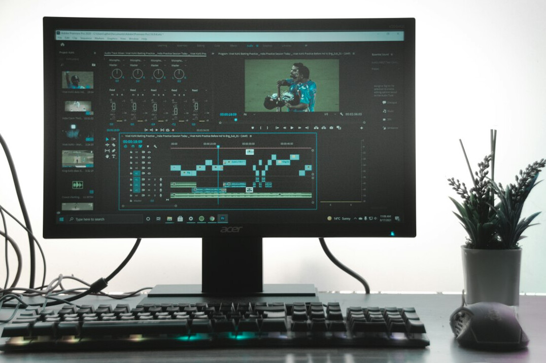 professional video editor at computer