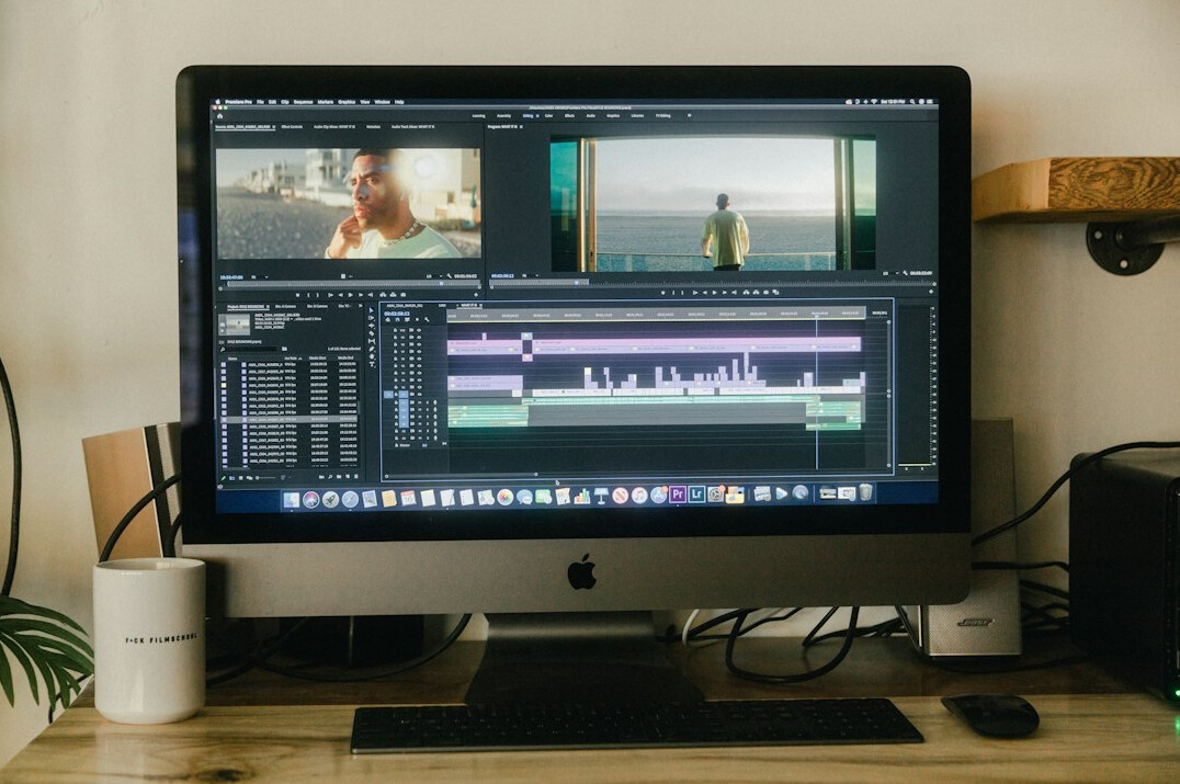 video editor working on computer